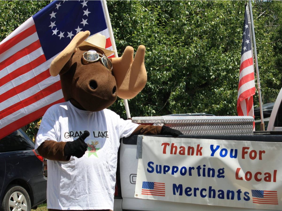 Slide 9 - Picture of the town mascot Bruce the Moose in support of our local merchants taken in Grand Lake, Colorado.